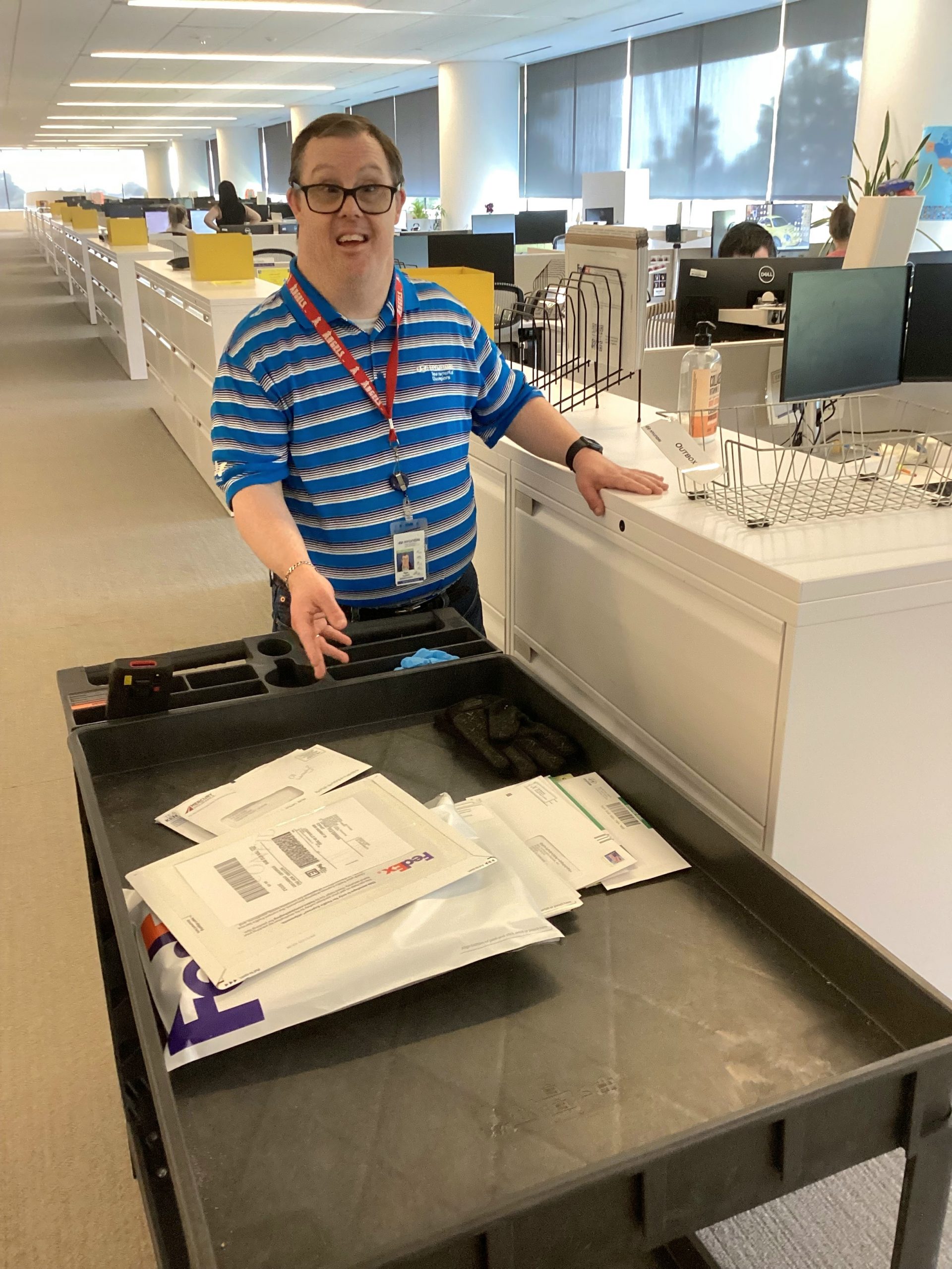 Project Independence supported employment client Ryan working at Hyundai Motor Corp in the mail room in Fountain Valley. 