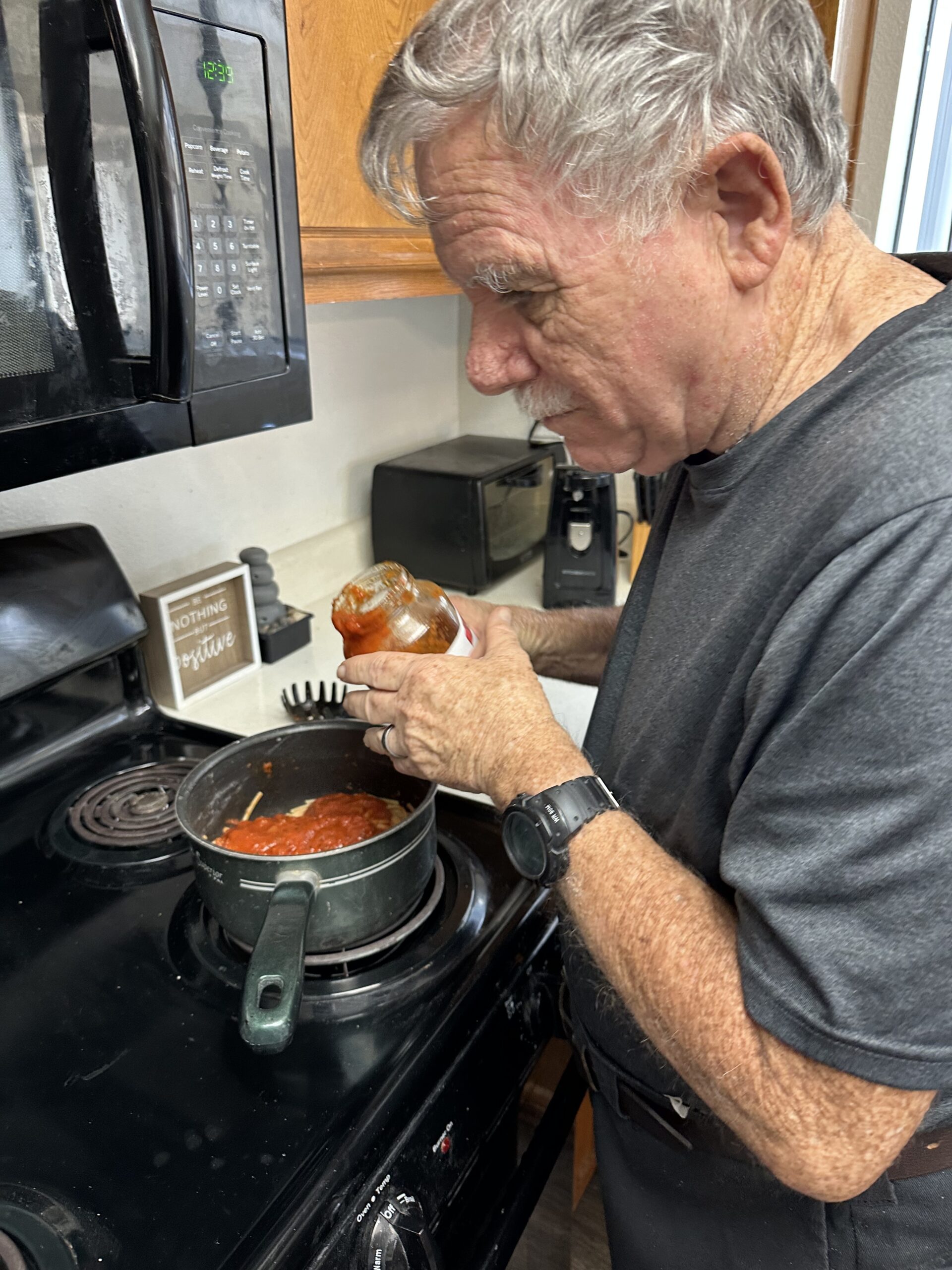 brad_meal_prep_2 Independent Living Client at Project Independence cooking in his kitchen